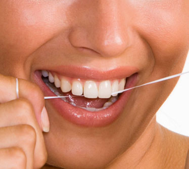 flossing1 Top 10 Basic Hygiene Activities That Are Often Neglected